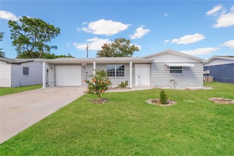 Photo of 3253 Masonville Loop, Holiday, FL 34691 (MLS # TB8433193)