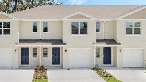 Photo of 1653 Great Osprey Way, New Smyrna Beach, FL 32168 (MLS # O6423097)
