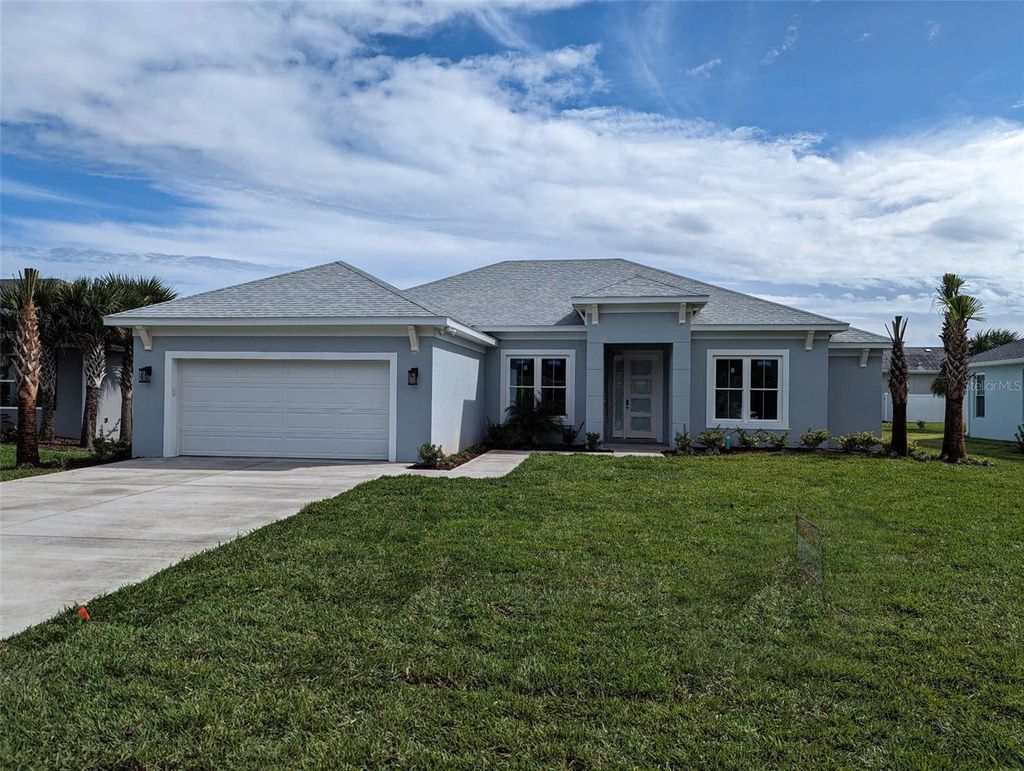 Photo of 38 Armand Beach Drive, Palm Coast, FL 32137 (MLS # FC311588)
