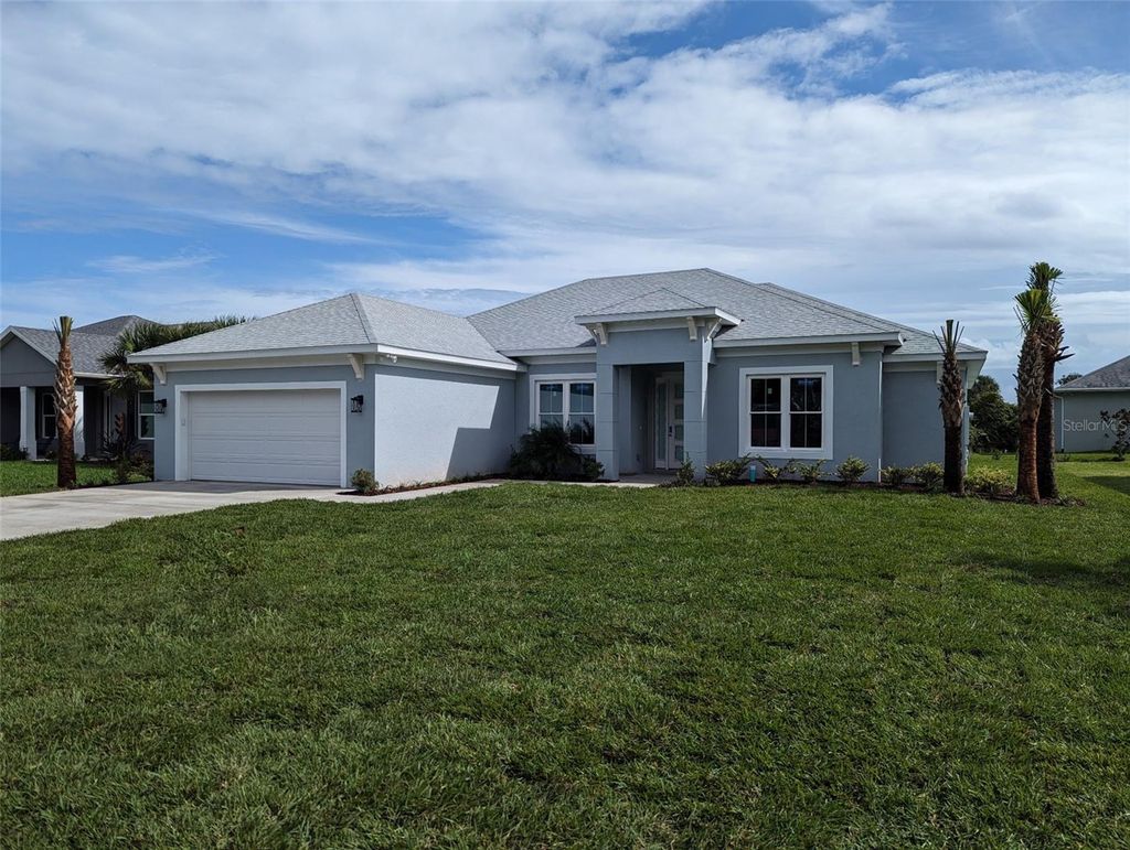 Photo of 38 Armand Beach Drive, Palm Coast, FL 32137 (MLS # FC311588)