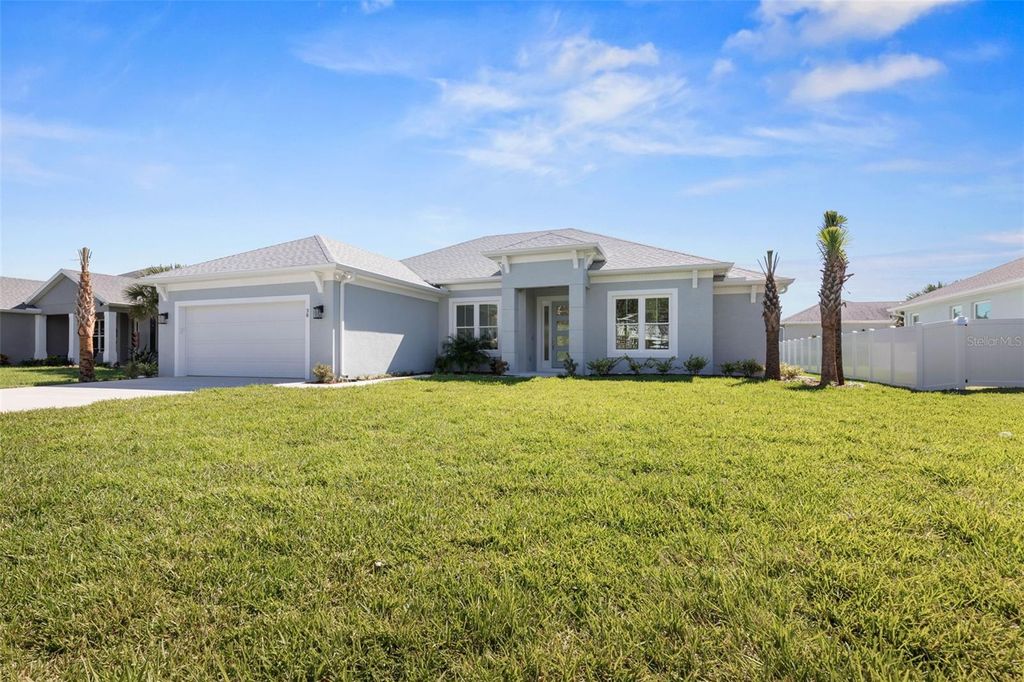 Photo of 38 Armand Beach Drive, Palm Coast, FL 32137 (MLS # FC311588)