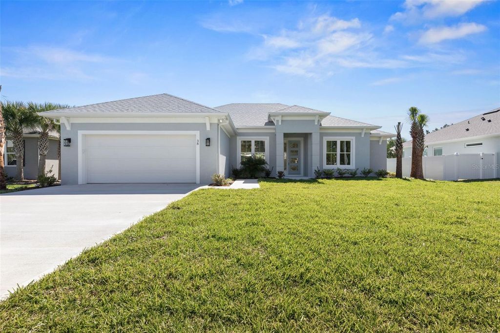 Photo of 38 Armand Beach Drive, Palm Coast, FL 32137 (MLS # FC311588)