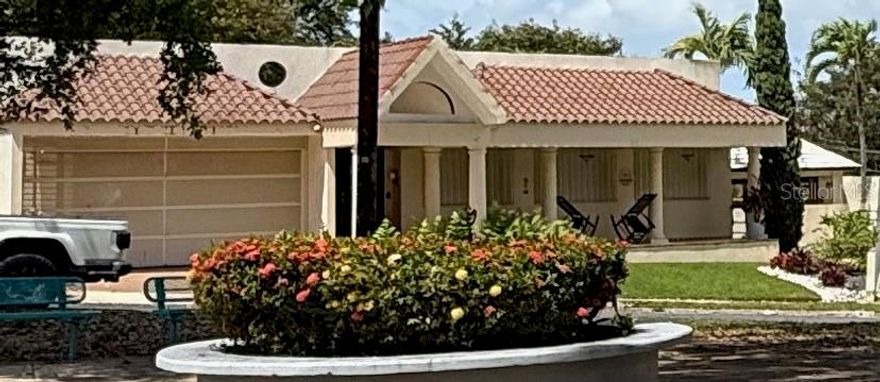 Beautiful two-level residence in Hill Mansions, San Juan, conveniently located near Hospital San Lucas and Cupeyville School, with easy access to main roads, schools, shopping, and everyday conveniences. Situated on a 799.69 sq. m. lot and offering approximately 3,000 sq. ft. of living area, this property features excellent outdoor living spaces including a swimming pool, gazebo, patio, porch, open terrace, storage areas, and spacious paved surroundings. The entry level features the main kitchen, living-dining area, one full bathroom, a two-car garage, and a private apartment within the residence with 1 bedroom, 1 bathroom, and kitchen. Recent improvements include a new pool pump (2025), new Danosa roof with 10-year warranty (2023), 600-gallon water cistern and pump (2023), all A/C units replaced in 2023, upgraded electrical lines (2023), security cameras, dishwasher, and an additional plug-in for a gas generator. The home also features 40+ solar panels and Tesla Powerwall battery backup that service the entire house. Solar system is subject to an existing 25-year Sunnova lease. Buyer must qualify to assume the solar lease. Current monthly payment is approximately $593.08 with Auto-ACH. Excellent opportunity to own a well-improved home with great outdoor amenities and energy-efficient features in a prime San Juan location.