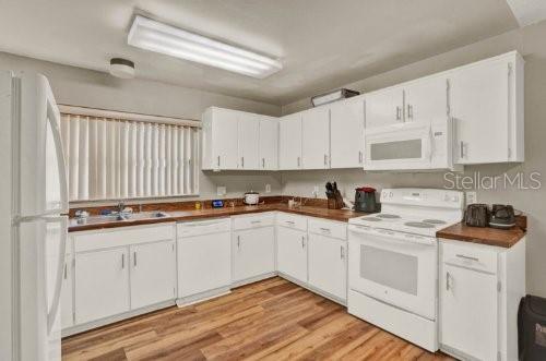 Photo of 451 Hunter Circle, Kissimmee, FL 34758 (MLS # O6427901)
