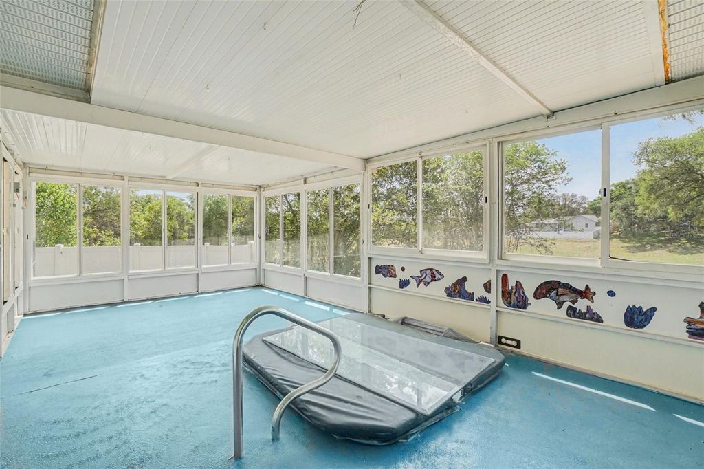 Photo of 808 Chamberlain Loop, Lake Wales, FL 33853 (MLS # TB8493781)