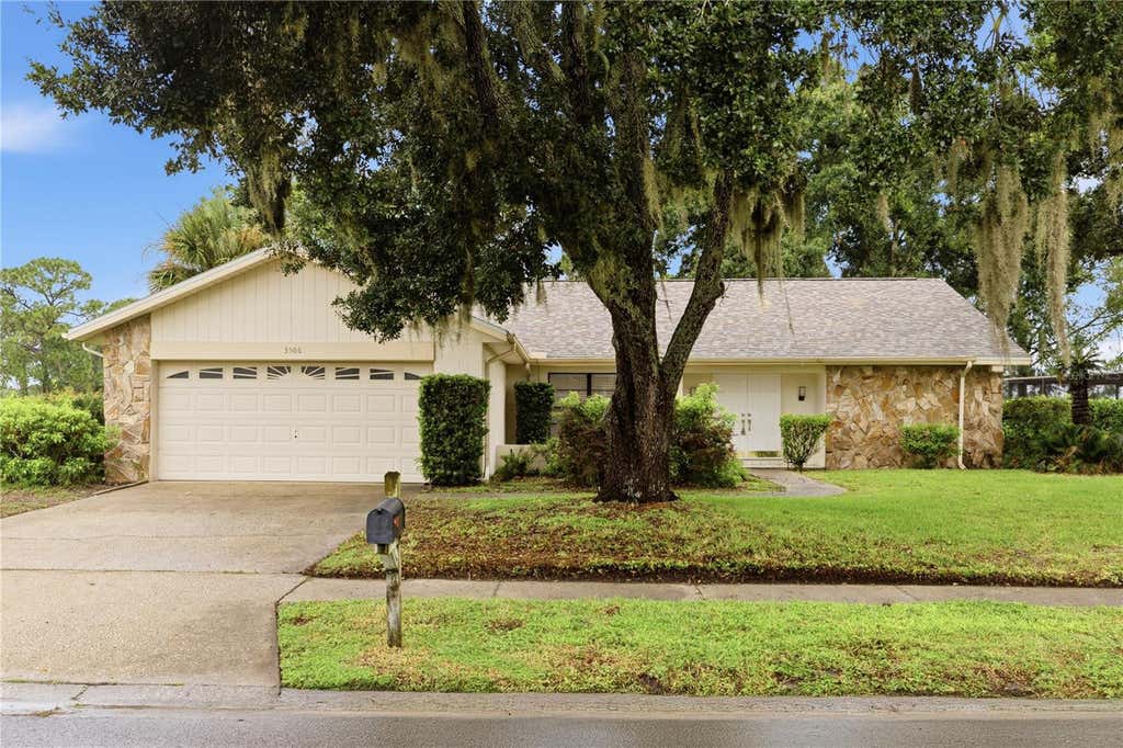 Photo of 3506 Fairway Forest Drive, Palm Harbor, FL 34685 (MLS # TB8536318)
