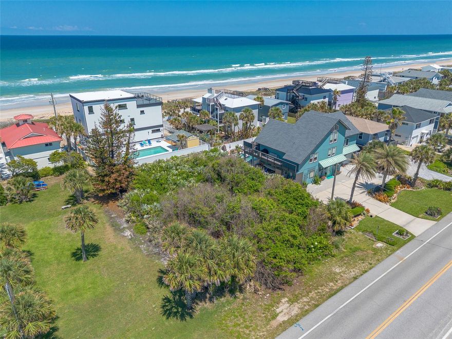 Beautiful 75x100 building. Lot near the no-drive New Smyrna Beach.  7,500 sq ft vacant lot.  Possible Ocean/Water views.  Beach Access.