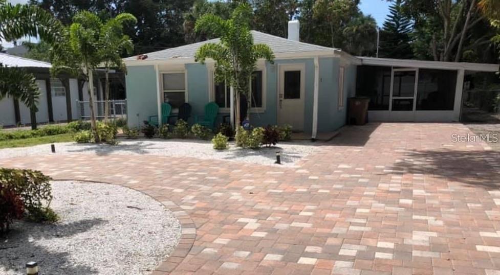Beach Lovers, this is the perfect home for you at an INCREDIBLE PRICE & Amazing location steps to the beach! Don't overpay for a tiny beachfront condo with high monthly fees when this home offers space with 3 full bedrooms, 2 full size bathrooms + Den, Screened Patio and private fenced yard while only a short 2 minute walk to a gorgeous sandy & desirable Indian Rocks Beach...you never have to look for parking again to enjoy a relaxing day at the beach. The home has a large front yard with paver circle driveway for extra parking (which is ideal for air bnb rental - which is allowed - but no street parking allowed) on a 5685 sq ft lot with large, fenced backyard and screened in patio. The master bedroom is large in size with a large walk-in closet and attached master bathroom with updated step in shower. Outside, the screened in, covered patio is huge and perfect for entertaining at home when you are not out on the beach. With stunning views and soft white sand, This is the ideal beach spot to spend your day in the sun or visit great places to eat, activities and shopping including the local's favorite spot...John's Pass. Indian Rocks is also not very touristy, its a little less busy and home to many locals that call this area home. Updates you will love is the tile flooring in the main areas, updated electrical panel, 2022 AC system, Updated plumbing, paver circle driveway, automatic roll-down hurricane shutters & Newer roof. Don't miss the opportunity to own this home right by the beach at a great price and enjoy living the Florida lifestyle. The home was flooded in Helene. Some damage has not been corrected - minimal damage - the affected drywall was removed, the pictures were taken before the storm.
