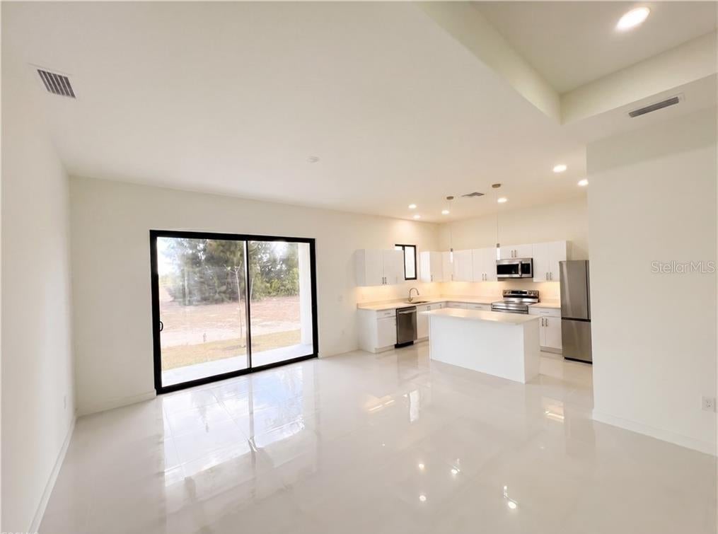 Photo of 2113 NW 41st Avenue, Cape Coral, FL 33993 (MLS # O6447448)