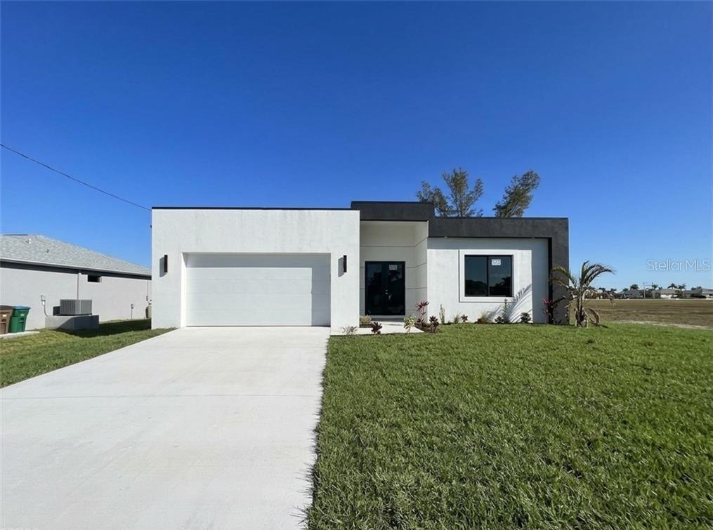 Photo of 2113 NW 41st Avenue, Cape Coral, FL 33993 (MLS # O6447448)