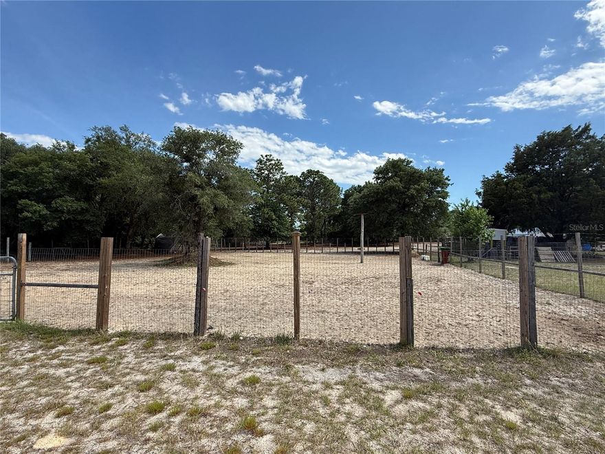 Beautiful 1-acre lot, cleared and fenced, located on a paved road in the peaceful community of Rainbow Lakes Estates. Bring your floor plan and start building your dream farmhouse in a serene setting away from the congestion of the city, yet still within approximately 30 minutes of groceries, restaurants, medical offices, and everyday conveniences. Enjoy the best of Florida’s natural beauty and recreation with Goethe State Forest, Rainbow Springs State Park, and the World Equestrian Center all within about 40 minutes. A great opportunity to create your ideal lifestyle with space, privacy, and nearby attractions.  Seller has other 2 lots on the same street.