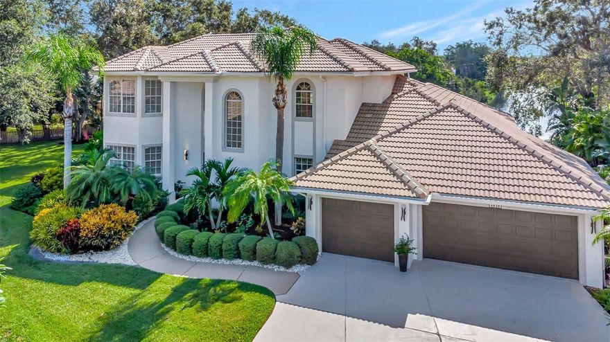 This two story beautiful home is nestled in a cul-de-sac and is in one of the very few gated communities West of the Trail in Sarasota. It is surrounded by mature beautiful oak trees and luscious vegetation with a great view of a large pond with a water fountain.
As you enter the home through the double door entry the first level features the exceptionally large formal living and dining space, giving you a welcoming ambiance that is complimented by high ceilings and large windows with a great view of the back yard and pond.
On the left side there is an office/den and a private guest bedroom suite with a full bath. On the right side of the home you will find a spacious kitchen and family room with an open feel and beautiful views of the pool and pond. In the pool patio or backyard, you can enjoy a morning coffee or afternoon quiet time.
The wood staircase leads you to the second level where there is the oversized master suite with a large walk in closet, a spacious bath and bay windows overlooking the pond. The other two large bedrooms have walk in closets, large windows and share a full bathroom. In between the master bedroom and two bedrooms is a multifunctional space.
Additional features include a three car garage, a large laundry room with plenty of storage space that includes a built in multipurpose workspace, a new roof just installed in November 2023 with a 20 year warranty and a new seamless gutter system with a five year warranty.
The property is just a 15 minute drive to Siesta Key Beach, 25 minutes to the airport and within walking and biking distance to the Landings plaza where there are plenty of dining, shopping and fitness options. For a low monthly cost, the Landings offers its residents access to its clubhouse with a swimming pool, fitness center, hot tub and eight har tru tennis courts. Residents can also take advantage of the nature trail, gazebo and kayak storage.
* This house was custom built by the owner in 1996 and has not been sold.