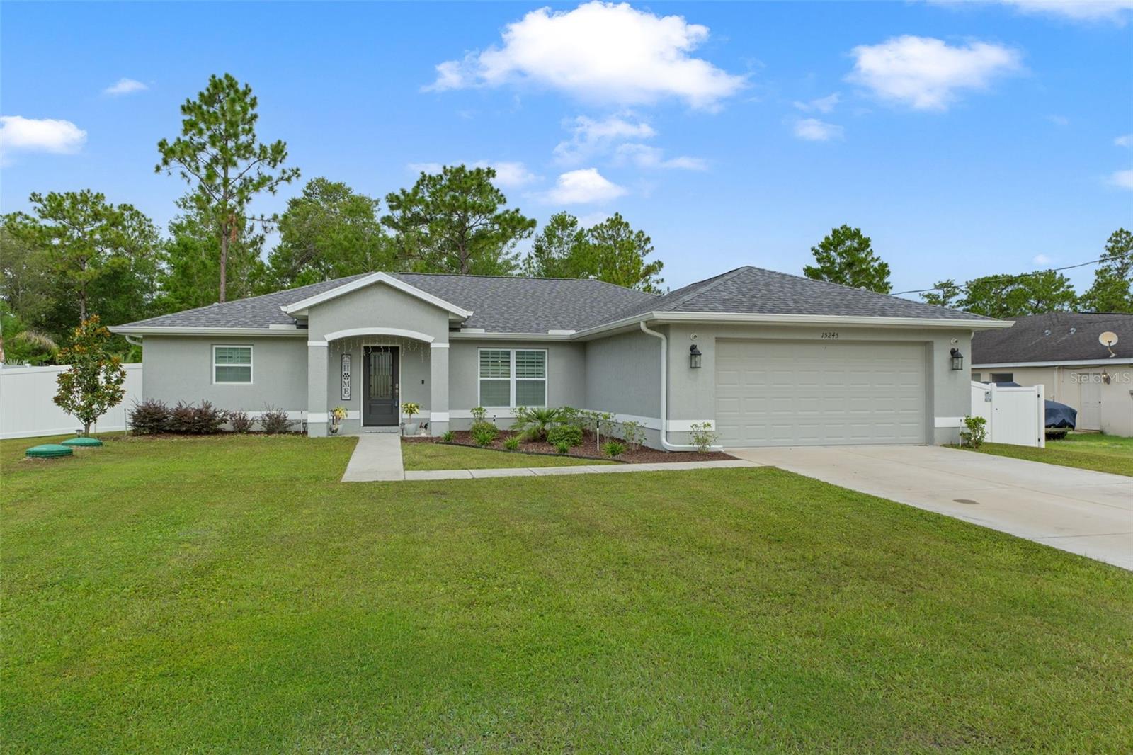 Stop the search—your dream Florida home has officially hit the market! Just 2 years young and packed with upgrades, this beauty sits on a spacious .46-acre lot with a PVC privacy fence, 14x10 storage shed, and a nearly new hot tub—ready for relaxing evenings under the stars. Inside, you’ll love the elegant wood-look ceramic tile throughout, custom plantation shutters, sparkling granite countertops, upgraded LG appliances, under-cabinet lighting, and ceiling fans in every room. The primary suite features a new glass shower wall, and the entire home shines with thoughtful finishes. Step out to the massive 30x20 screened lanai—perfect for entertaining or unwinding in peace. Yard irrigation is already installed, gutters are in place, and the septic system was just serviced. Best of all, you're just minutes from Weeki Wachee, Bayport, Aripeka, and some of the best fishing and outdoor fun Florida has to offer—plus under an hour to Tampa International! Don't wait—schedule your tour today and start living the Florida lifestyle you deserve!