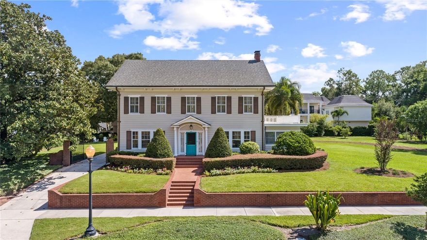 Welcome to this exquisite estate home nestled in the heart of Delaney Park, where charm, character, and prime location seamlessly blend. Situated on a sprawling .64 acre lot, this residence boasts a rare and generous piece of downtown real estate. With a rich history spanning generations, this home has been meticulously renovated and lovingly maintained over the years. Upon arrival, you'll be captivated by the grandeur of this property, marked by a welcoming gate flanked by elegant brick columns and a majestic magnolia tree.  As a bonus, the seller has generously provided plans for a new two-story three-car garage with a workshop and a guest house, offering endless possibilities for expansion. Step inside, and you'll be greeted by the warmth of beautiful hardwood floors and an abundance of natural light in the stately foyer. The oversized living room is a showcase of sophistication, featuring a stunning wood-burning fireplace adorned with stone and brass accents. Beyond, a spacious bonus room with built-ins and an exterior door offers a versatile space, perfect for an office, den, or playroom. The gracious dining room sets the stage for memorable entertaining and family gatherings. The chef's dream kitchen is a culinary masterpiece, featuring pristine white wood cabinets, quartz countertops, a convenient wet bar with a second sink, a six-burner gas range with a pot filler and range hood, and a second built-in oven and warming drawer. Adjacent to the kitchen, a charming breakfast nook with original tile floors awaits. A guest half bathroom adds to the convenience. The fifth bedroom, located downstairs, currently serves as a family room with an en suite bathroom and closet, accessible from an exterior door, making it an ideal in-law suite. The screened porch is the perfect place to relax. Ascend the beautiful stairwell with intricate railings to discover the upstairs living quarters. The primary bedroom offers a luxurious sanctuary with two walk-in closets and a breathtaking en suite bathroom featuring dual sinks, a soaking tub, and a glass-enclosed walk-in shower. Additionally, there's a spacious laundry room equipped with a sink and a commercial washer and dryer. Three additional generously sized bedrooms complete this level, and you can enjoy serene views from the upstairs balcony. In addition to the 3,678 square feet of living space, this home boasts a full basement and a vast attic with spray foam insulation, providing excellent storage or potential for future expansion. Additional features include CAT 5 cable, irrigation, security system and termite bond. The downtown Orlando lifestyle doesn't get any better than this! You'll be just a stone's throw away from Delaney Park's baseball fields, tennis courts, and playground. Nearby attractions include Lake Davis, Lake Cherokee, Orlando Health/Winnie Palmer, SODO, Dr. Phillips Performing Arts Center, Thornton Park, and a host of local amenities. The Lake Copeland Historic District even hosts quarterly neighborhood socials. The Sunrail station is conveniently within walking distance. Zoned for highly sought-after Blankner K-8 and Boone High School. Don't miss your chance to own this remarkable Delaney Park estate.