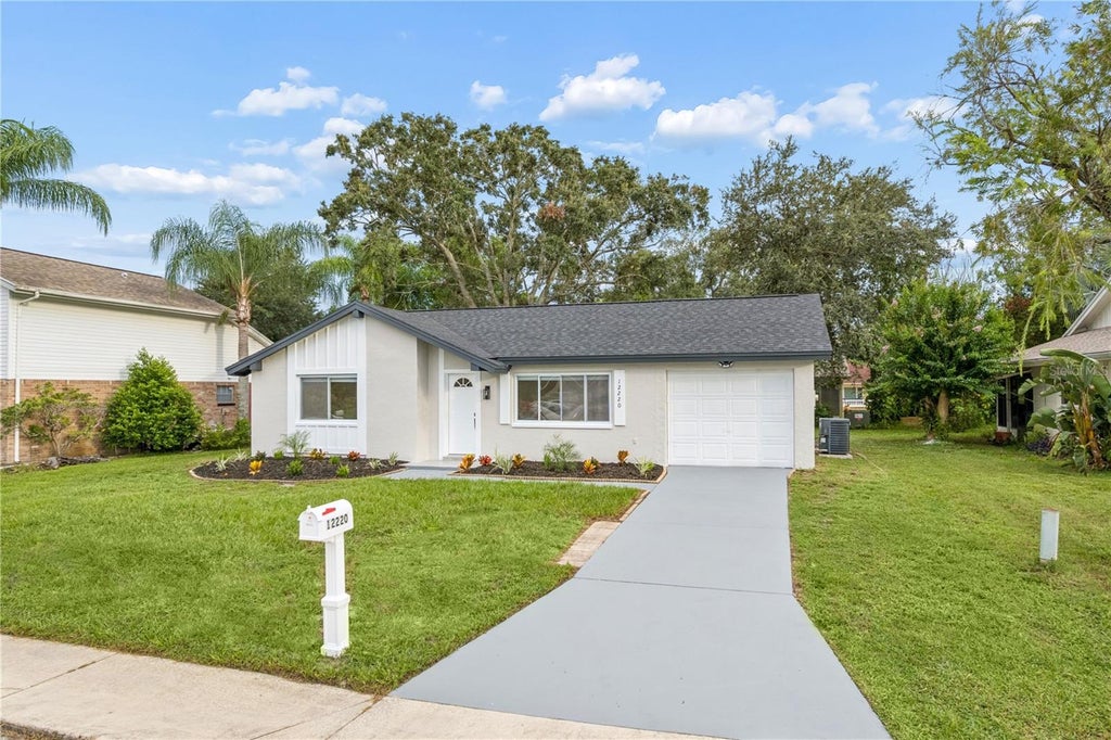 Photo of 12220 Meadowbrook Lane, Hudson, FL 34667 (MLS # W7889247)