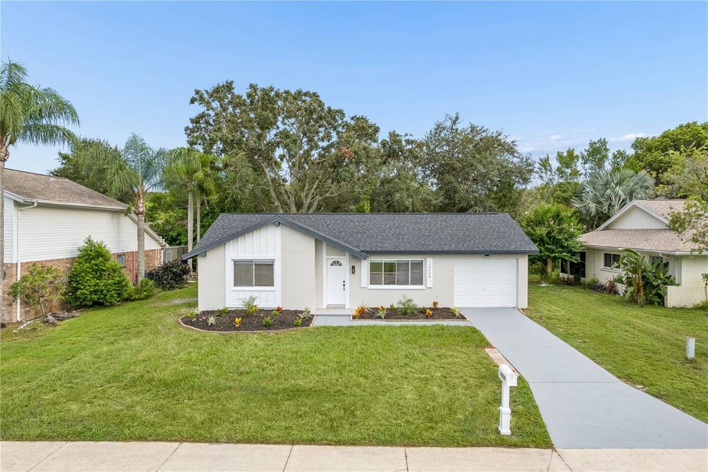 Photo of 12220 Meadowbrook Lane, Hudson, FL 34667 (MLS # W7889247)