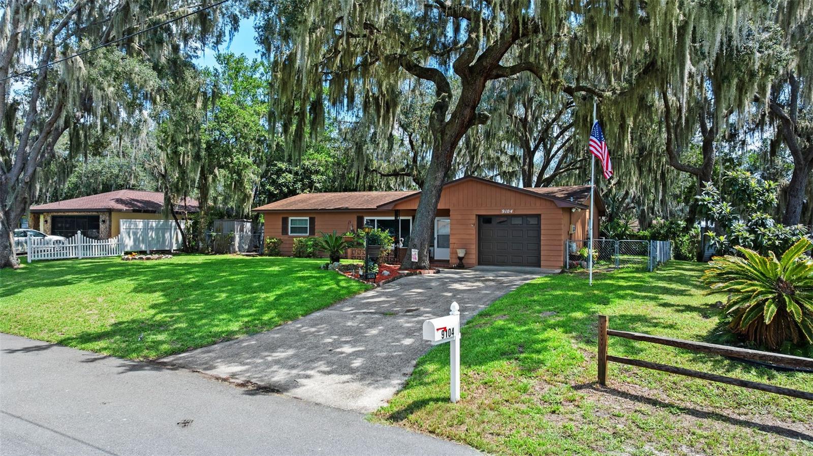 This updated 2 bedroom home sits on a spacious O.25- acre lot and is packed with upgrades.The modern kitchen offers the perfect spot for entertaining. Enjoy your morning coffee in the Florida room looking into your lush backyard filled with fruit trees and exotic plants and wildlife.
The living room features a built in entertainment center and a serene canal view.The primary bedroom easily fits a king-size bed with room to spare. While the renovated full bath and convenient half bath add comfort and style. The one car garage has workshop and storage.
Don't miss this unique home with indoor -outdoor living and natural beauty all around. Roof 2019 HVAC 2016 Wndows 2016