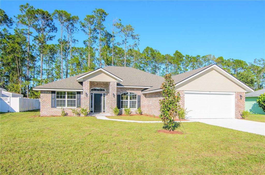 Photo of 74 Princeton Lane, Palm Coast, FL 32164 (MLS # FC318035)