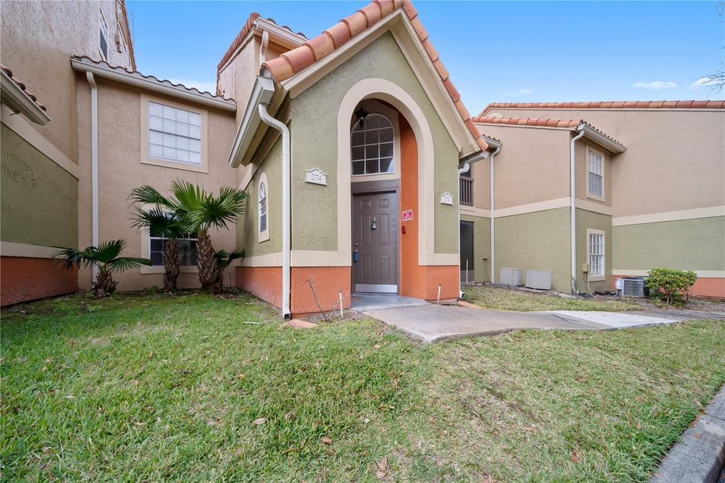 Photo of 441 Fountainhead Circle #174, Kissimmee, FL 34741 (MLS # O6397748)