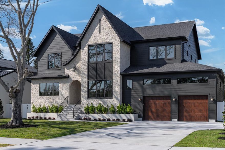 Exquisite Modern Tudor Estate in Snell Isle.

     Welcome to 1056 Snell Isle Blvd NE, where timeless elegance meets modern luxury. This stunning custom-built home offers an unparalleled blend of sophistication, craftsmanship, and state-of-the-art design in one of St. Petersburg’s most coveted neighborhoods.

     Step inside to soaring 26-foot vaulted ceilings in the grand living room, accentuated by custom ceiling details, built-ins, and designer cabinetry throughout. With six spacious bedrooms and 5.5 beautifully appointed baths, this home is designed for both lavish entertaining and everyday comfort.

     The gourmet kitchen is a chef’s dream, featuring high end cabinetry, paneled appliances, large scullery and pantry, and a seamless flow to the expansive outdoor living space. Outside, enjoy Florida living at its finest with a custom pool and hot tub, a fully equipped outdoor kitchen, and a generous backyard—perfect for gatherings or quiet relaxation.

     Built to the highest standards of safety and efficiency, this home boasts impact-rated windows and doors, energy-efficient spray foam insulation, and compliance with all current hurricane codes. A spacious three-car garage completes this extraordinary property.

     Nestled in the prestigious Snell Isle community, this masterpiece offers both privacy and proximity to vibrant downtown St. Petersburg, world-class dining, and waterfront parks.



Experience a new level of luxury—schedule your private tour today.