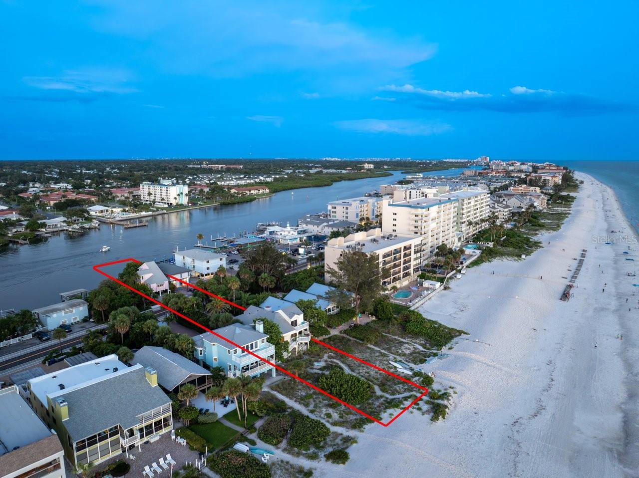No damage from last hurricane season. Ready for new owner to move in.
This is an extraordinarily unique and especially attractive Beach front to Bay front opportunity in Indian Shores, known for its prime location in what locals call “The Narrows” where lucky residents can enjoy both the pristine powdery sand beach and Gulf of Mexico sunsets as well as Sunrises and bay views from your guest home and boat dock on the bay and Intracoastal waterway.
Exceptional custom built and only one owner, Dual-House investment or extended family compound opportunity where one can experience the ultimate coastal lifestyle with this rare chance to own two stunning homes. The larger home has a brand new roof installed December 2024 and sits on the shore of the Gulf of Mexico with Key West vibes featuring three ensuite bedrooms. The Primary bedroom/bath retreat is perched on the third level all to itself. Extensive balconies on all levels and off all of the rooms welcome you to enjoy the wonderful breezes and vistas. The open great room living and kitchen area features soaring ceilings and captivating Gulf and Beach views. The guest home is nestled between the mangroves on the bayside with your private dock and boat lift along the deep water Intracoastal waterway. This captivating guest home would also make a wonderful office or art/music studio for those who need to have some separation to focus on work or their skill. The guest home features another 3 bedrooms and two baths again with the Primary bedroom/bath retreat being upstairs all to itself. The guest home kitchen and living area is also an open great room design with specular views of nature, the water and boats slowly passing by in the no wake zone.
Indian Shores is on the western coast of Tampa Bay with easy access to Tampa and St Petersburg/Clearwater Airports.
• This stunning property is walking distance or a short golf cart or bike ride to an array of restaurants, shopping, and amenities
• Convenient yachting access to the Gulf of Mexico via Clearwater Pass to the north or Johns Pass to the south
• Legal for short-term rentals are allowed making this a great investment opportunity if desired.
There are two garage parking spaces in addition to under building parking and an enormous drive way with more than ample guest parking.
Live in a vacation paradise full-time or part time with this extraordinary dream oasis. Property is only being offered as a combined package including both 20051 and 20052 Gulf Blvd.