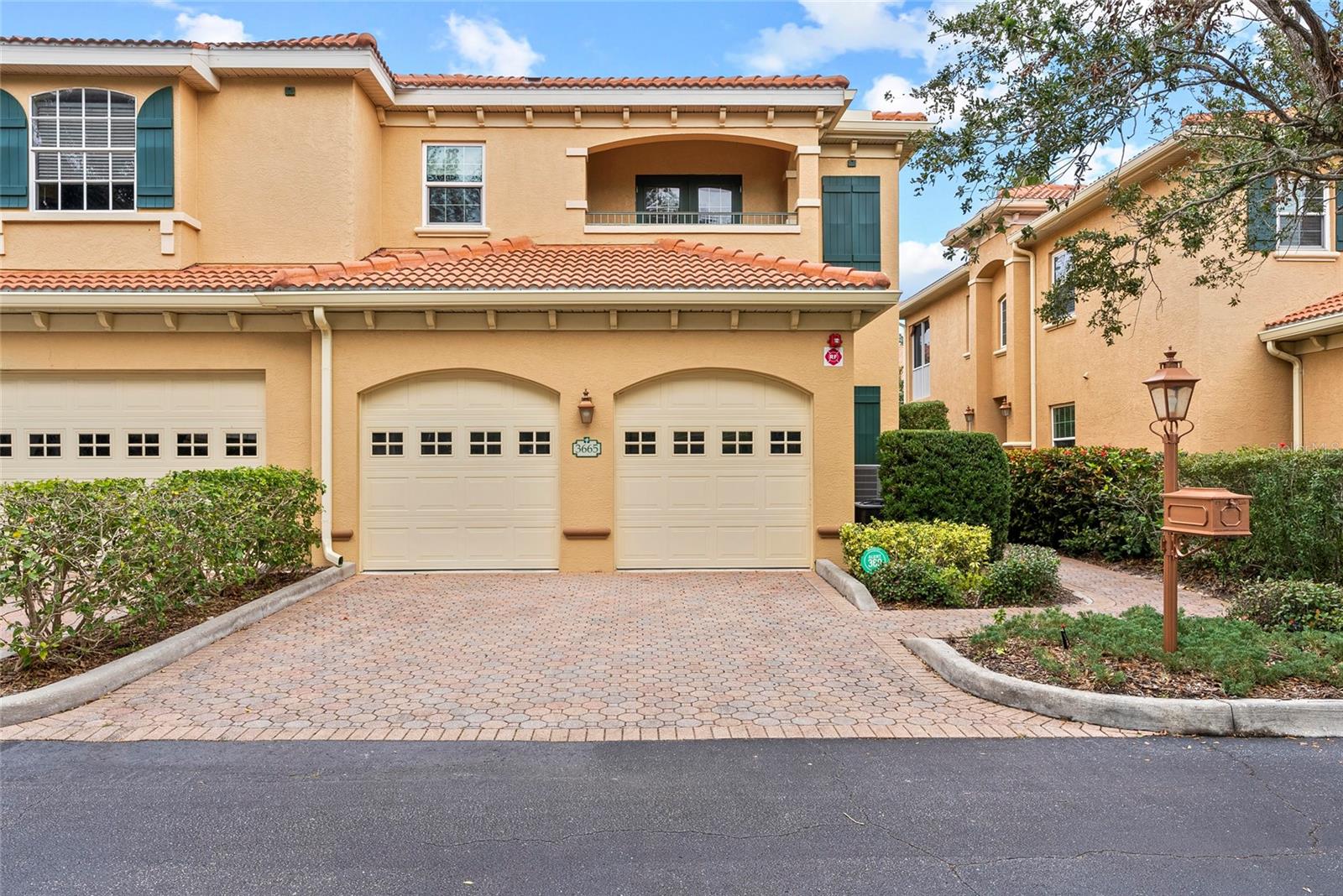 Start living the Florida lifestyle today with a move-in ready townhome in the ideally located community of Palmer Square West. This 3-bedroom, 3-bathroom unit is in excellent condition, a new A/C system, and being sold turnkey furnished, making it a perfect choice - whether for your primary residence, vacation home, or rental investment. Features in this townhome include high ceilings, crown molding, ceiling fans, luxury vinyl and tile flooring, plus impact resistant windows on all windows except the sliding doors and dining room bay window. The first floor offers living and dining areas, a beautiful eat-in kitchen with wood cabinets and granite countertops, a screened-in lanai running the width of the unit, plus a den or option of a third bedroom with an ensuite bath. The two-car garage has several storage areas, opens into a separate laundry room, and then into the kitchen. Two large bedrooms are located on the second floor, each with ensuite bathrooms, one with a private balcony; both have recently been painted and have new luxury vinyl flooring. Townhomes at Palmer Square West provide residents the peace of mind of living in a smaller, safe and secure, maintenance-free community, with brick paver driveways, new exterior painting and new barrel tile roofs on all 29 units, paid for and completed in 2023. In addition to relaxing at the community pavilion with heated pool and spa, or on the screened-in lanais overlooking the extensive landscaping, ponds and fountains, close proximity to shopping, restaurants, medical care, sports and recreation facilities – including a short drive to one of the best beaches in the world, Siesta Key – allow residents to stay close to home to enjoy year-round Florida living.