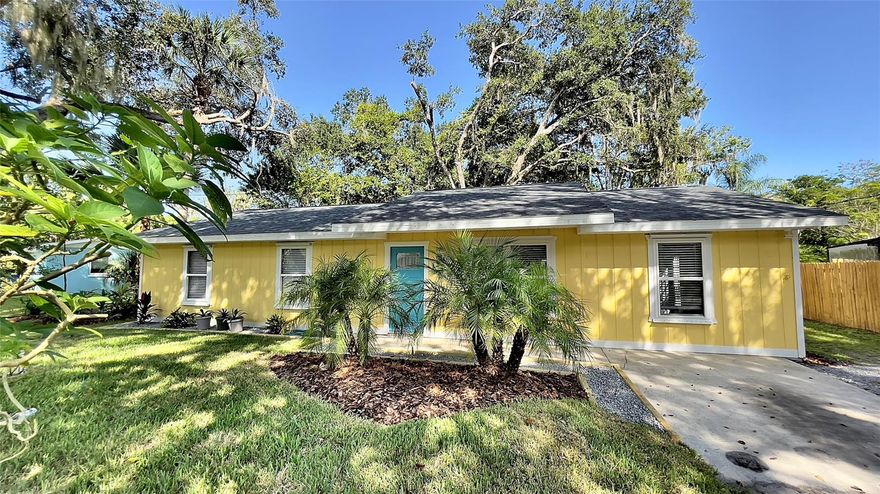 Remodeled 3 bedroom, 2 bath home on huge 75 x 200 tree filled lot in New Smyrna Beach. New Roof.  All New Flooring. Painted inside and outside. New Kitchen and Baths. ($2,000. appliance credit to buyers) Large open living space. French doors open onto deck overlooking a beautiful back yard with large oaks and palms. There is plenty of room for a pool, metal building, fire pit, or boat storage.  No HOA.  Close to the beach, the river, schools, and shopping.  
 You don't want to miss this one!! ;Water: City