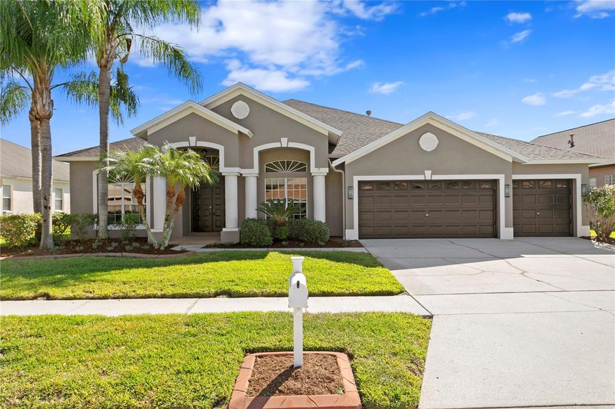 Gorgeous popular Southern Crafted-built Siesta Key model in gated Covington Estates.  This floor plan features one of the largest kitchens for a home of this size that is centrally located making it the focal point in the home.  Great room plan with four large bedrooms PLUS a study, formal dining room and a three-car garage. Over eleven foot ceilings with transom windows in the living area allow plenty of natural light into this home. Just painted both inside the home and the exterior of the home.  The roof was replaced in 2017 with a dimensional shingle.  The AC system is new in 2023.  The master bath has been updated with a new walk in shower with frameless grass enclosure, a new garden tub and tile.  Split vanity with private water closet and two large walk-in closets.  Landscaping was just upgraded and refreshed. Plenty of room to play in the large fenced yard.  New stainless steel appliances to include a Bosch dishwasher, French door refrigerator, gas range, and brand new built-in microwave oven.  Top quality laminate flooring (in 2018) in the foyer, study, dining room, kitchen, dinette, great room, hall bathroom, laundry room and the hallways.  Ceramic tile in the master bathroom. New carpet (in 2022) in all four bedrooms. Additional home improvements include new recessed lighting, new bathroom and kitchen faucets, new master bathroom shower head and more. Very well maintained and move in ready.  Pride of ownership evident.  Covington Estates is conveniently located to excellent schools, shopping and recreation. 20 minutes to the University of South Florida, the Moffit Cancer Center, the James A Haley VA Hospital, Busch Gardens, the Premium Outlet Mall and more.  Hurry!