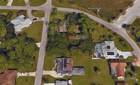 Photo of 581 Spruce Street NW, Port Charlotte, FL 33952 (MLS # C7467547)