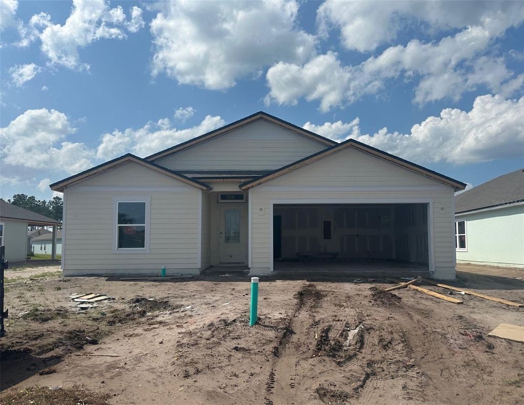 Photo of 55 Hulett Woods Road, Palm Coast, FL 32137 (MLS # FC300449)