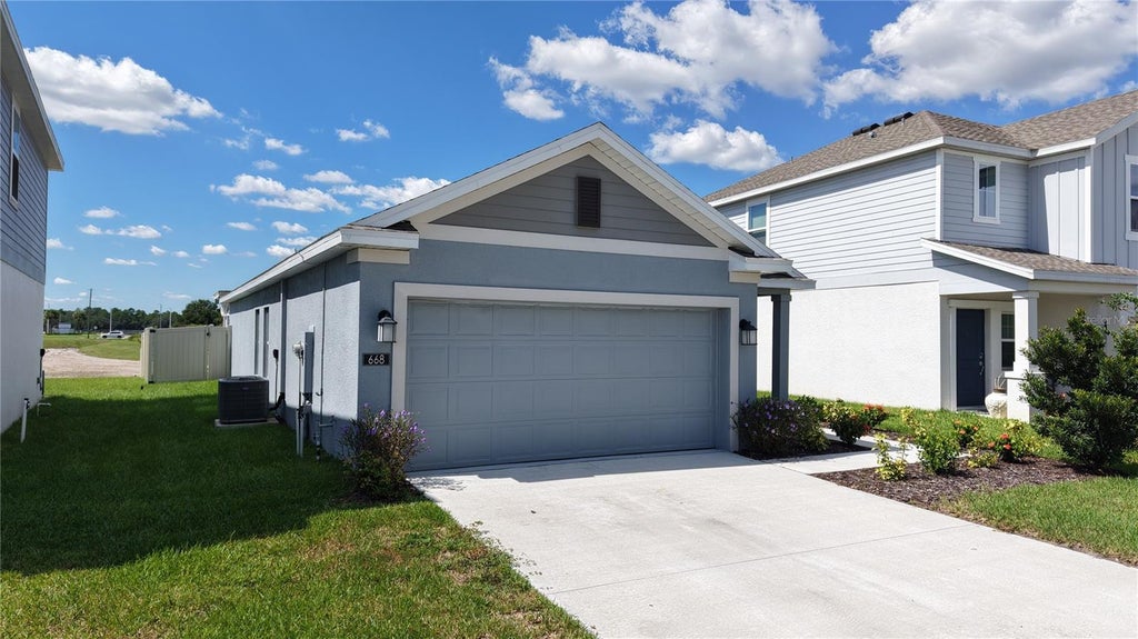 Photo of 668 Reggie Road, Winter Haven, FL 33884 (MLS # O6450053)