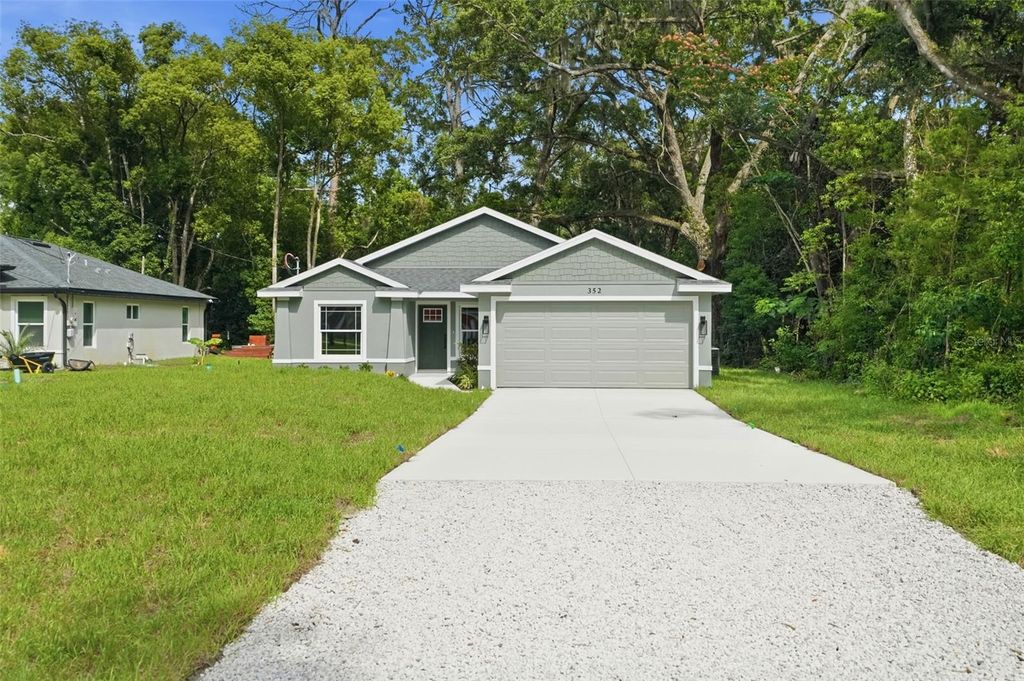 Photo of 352 Garfield Ave, Masaryktown, FL 34604 (MLS # W7886450)