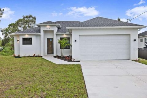 Photo of 812 Homestead Road S, Lehigh Acres, FL 33974 (MLS # TB8459735)