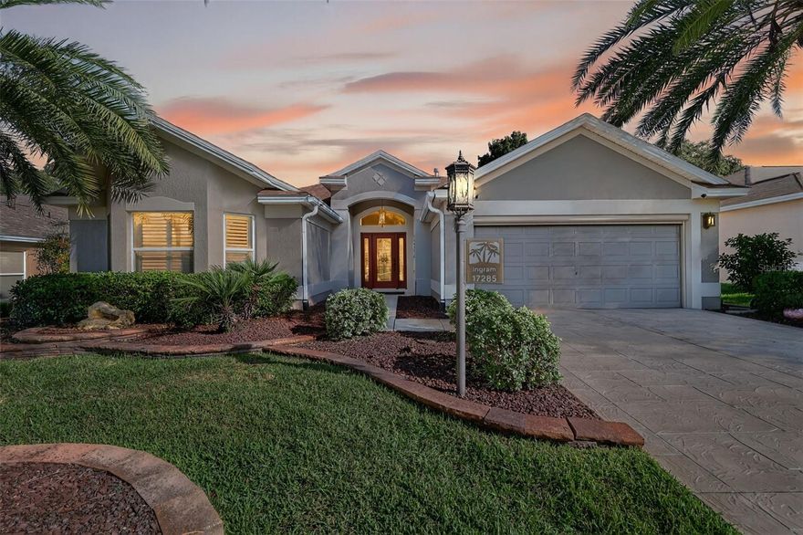Come discover a home where comfort and style meet effortlessly. This beautiful  EXTENDED LIVE OAK Block & Stucco MODEL is perfectly nestled in BRIAR MEADOW; the heart of The Villages. The home has been very well taken care of and exudes pride of ownership inside and out—meticulously landscaped with tropical palms and lush greenery that create instant curb appeal. Walk up the stamped concrete driveway and step through the front etched glass panel door and feel the welcoming elegance of this home. The spacious open layout is highlighted by decorative palm ceiling fans, lavish mirrors and chandeliers along with plush carpeting that fill the space with timeless charm. 
The kitchen is a true showstopper, featuring a skylite,  attractive GRANITE countertops, a large Eat in Area, a counter with two barstools and NATURAL GAS RANGE, STAINLESS STEEL appliances, along with an abundance of high end cabinetry—ideal for the chef who loves to entertain.
The primary suite offers a tranquil retreat which boosts an oversized closet complete with chandelier which is within an elegant en-suite bath complete with a Roman-style shower, solar tube and GRANITE-topped vanities with dual sinks.
The Guest suite is separate with a guest bathroom with tub and two lavishly carpeted rooms, one of which is oversized and looks out the front.
You’ll love the INSIDE LAUNDRY room, thoughtfully designed with an additional and very convenient OFFICE nook—perfect for keeping paperwork tucked neatly out of sight. 
The new roof (2023) and 2 car garage with dual remote screens is a added plus. There is a water filtration system and a 2025 replaced electrical irrigation box. The WATER HEATER will be REPLACED prior to closing.
Located close to many golf courses including GLENVIEW and NANCY LOPEZ Country Clubs & Golf, the FIRST RESPONDERS RECREATION CENTER, Pickleball courts,  shopping, and the VA Clinic.  This property has a mere $1649, Bond balance. 
This home truly invites you to live the ultimate Villages lifestyle of ease, class, fun, and connection.

Furnishings and staged items sold separately.
Come tour this exceptional Live Oak home today and see why it feels like home the moment you walk in!