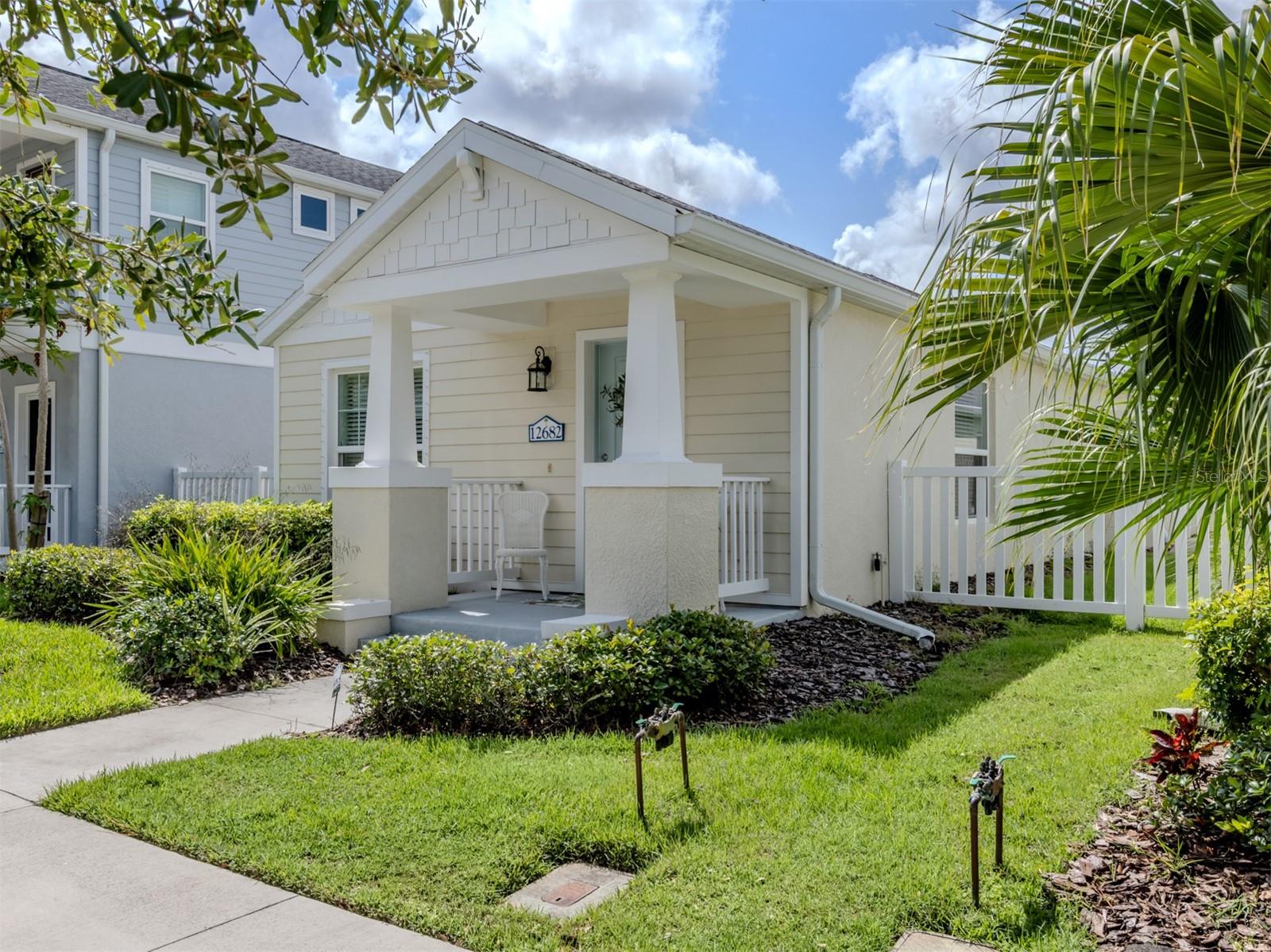 Welcome to Grand Palm! This low maintenance, 2 bedroom, two bath home with a two-car garage in this great resort-style neighborhood at a price that can't be beat! Located across the street from a nature preserve, makes for lovely views from your front porch. This home was gently used by the previous owner, so it is in "like new" condition. The lifestyle at Grand Palm is casual and relaxed and there is something for everyone if you like to keep busy! The clubhouse includes a well-equipped fitness center, resort-style pools, dog parks, a splash park and a playground. There are tennis courts, pickleball courts, basketball courts, volleyball courts, and bocce courts! There is an island with a kayak rack for residents to use in the community lake. Nature lovers will love the natural preserves and trails that meander through the community. Located near Wellen Park, the Braves Stadium, downtown Venice, with easy access to the interstate and the beach, Grand Palm is a unique and special place. A very reputable builder, Neal Homes, developed and built all of Grand Palm. Hurricane shutters are included, and furnishings are optional, Come check it out!
