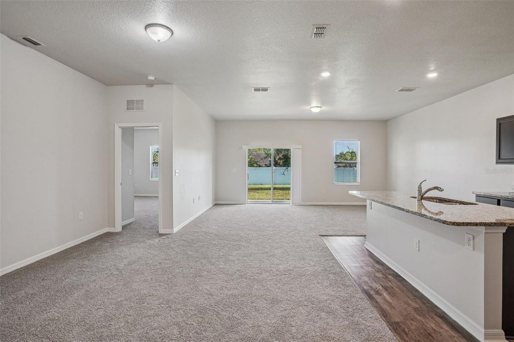 Photo of 3035 Nova Scotia Way, New Smyrna Beach, FL 32168 (MLS # O6354355)