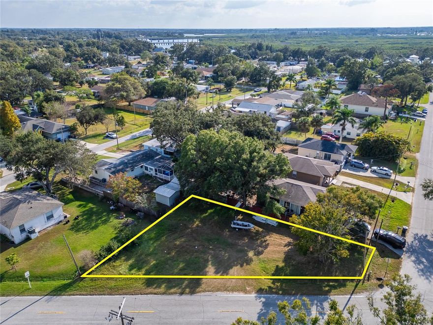 Discover one of the best values left in Ruskin! This cleared, corner lot is fully ready for your new build and sits in a prime location just minutes from shopping, restaurants, US-41, Hwy 301, and I-75 giving you fast access to everything the Tampa Bay area offers. Whether you’re heading to downtown Tampa, St. Pete, Brandon, or the beautiful waterfronts of Tampa Bay, you’re always just a short drive away.
A home previously existed on this lot that was connected to county water and county sewer. Even better the sewer is an LPSS system, a huge bonus that saves the next owner time and thousands in connection costs. Power is also easy to reconnect with a utility pole located directly in front of the property. This land has no HOA, no CDD, and offers the flexibility to build the home or investment property you’ve been planning without restrictions. With the lot already cleared, corner positioning, and utilities nearby, this is the perfect spot to start construction quickly. Opportunities like this in Ruskin’s rapidly growing corridor don’t last long especially at a price set to move. Bring your vision and make this property yours today!