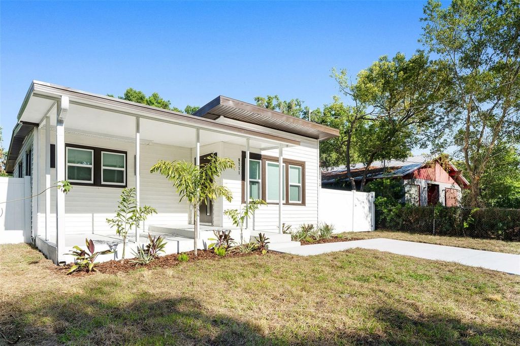 Photo of 8711 N Dexter Avenue, Tampa, FL 33604 (MLS # TB8499914)