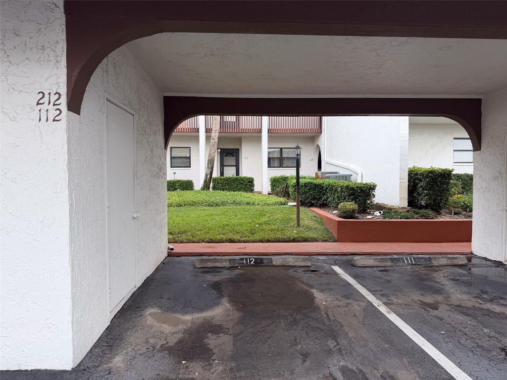 Photo of 7623 Radcliffe Circle #A112, Port Richey, FL 34668 (MLS # W7879841)