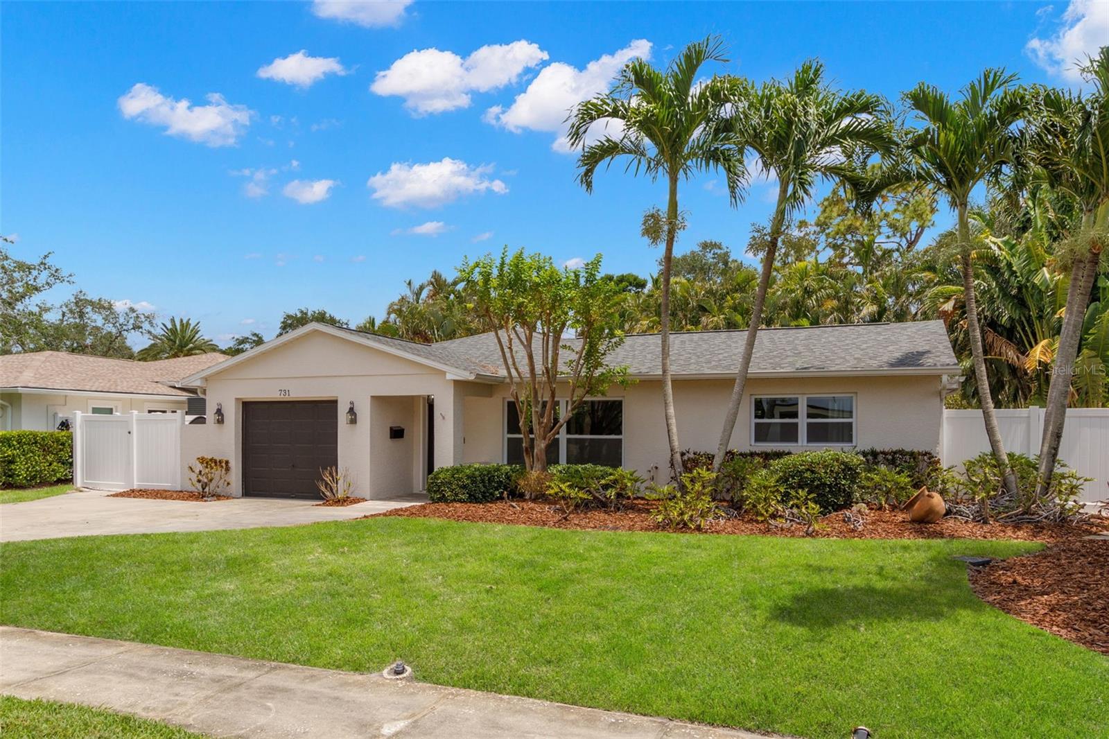 Don't miss this opportunity! Welcome to your dream pool home in the heart of Snell Isle, FL! This stunning 3-bedroom, 2-bathroom, one-car garage residence boasts a fabulous open split floor plan, seamlessly blending style and functionality. The interior is thoughtfully updated, featuring modern finishes and a chic design throughout. As you step through the front door, you'll be greeted by an open floor plan, creating a sense of spaciousness and flow. The interior is light and bright, adorned with wood-like tile flooring that exudes warmth and durability. Vaulted ceilings accentuate the openness, creating an airy atmosphere that complements the Florida lifestyle. The heart of the home, the kitchen, is a chef's delight, with quartz countertops, stainless appliances, and stone backsplash. It also boasts a coffee bar and a wine fridge for entertaining. The primary bedroom is a private sanctuary featuring an ensuite bathroom and ample closet space. The two bedrooms are located to the right of the kitchen, offering comfort and versatility for various living arrangements. Each room is bathed in natural light, creating an inviting ambiance. The home has a newer roof (2022), newer AC units, and hurricane-rated windows that provide peace of mind and efficiency, adding to the home's overall comfort. Step outside to your private oasis. The lush backyard is a relaxing haven, featuring a refreshing pool and a spacious covered lanai, perfect for entertaining friends. The property offers parking golf cart, paddle boards, kayaks or jet ski, catering to those with a penchant for waterfront adventures. Located just minutes from downtown St. Petersburg's waterfront (DTSP), this home perfectly balances tranquility and urban convenience. Explore the vibrant cultural scene, upscale dining, and waterfront activities within minutes of your home. Don't miss your opportunity to lease a piece of paradise. Schedule your private showing today.