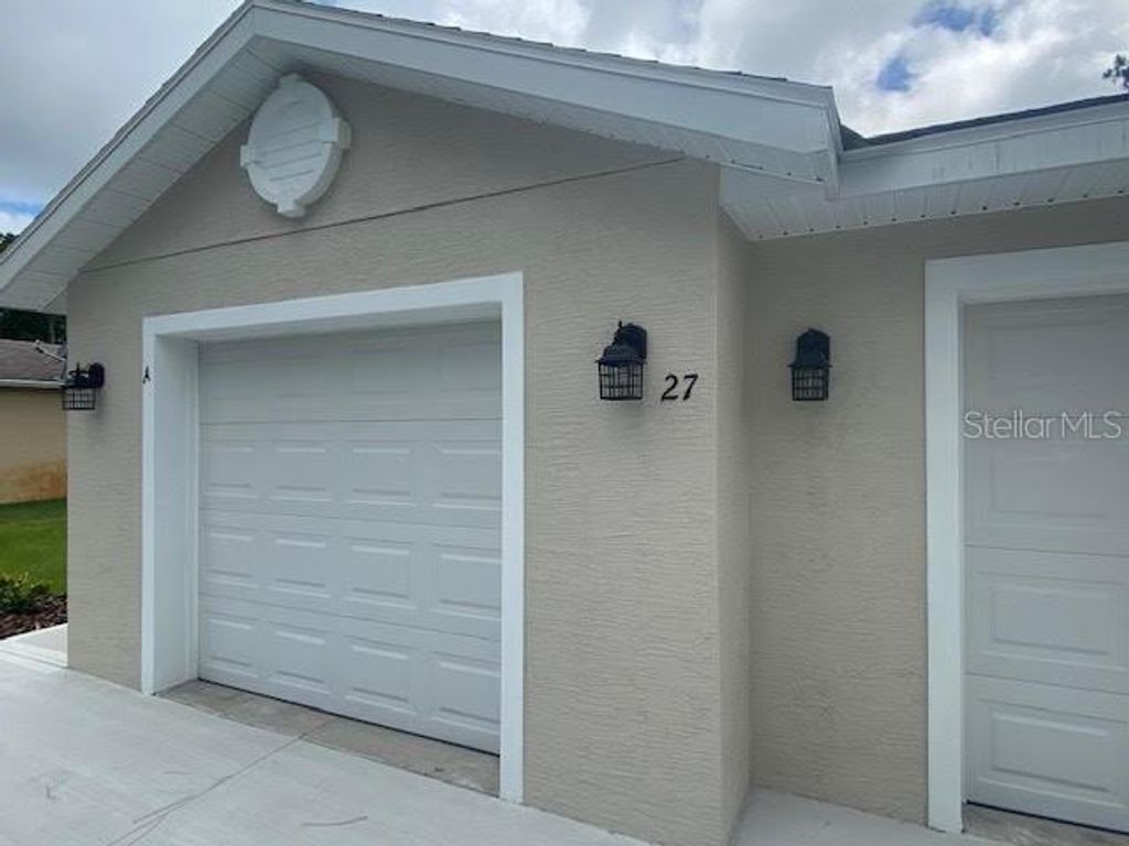 Photo of 27 Pony Lane #B, Palm Coast, FL 32164 (MLS # FC316047)