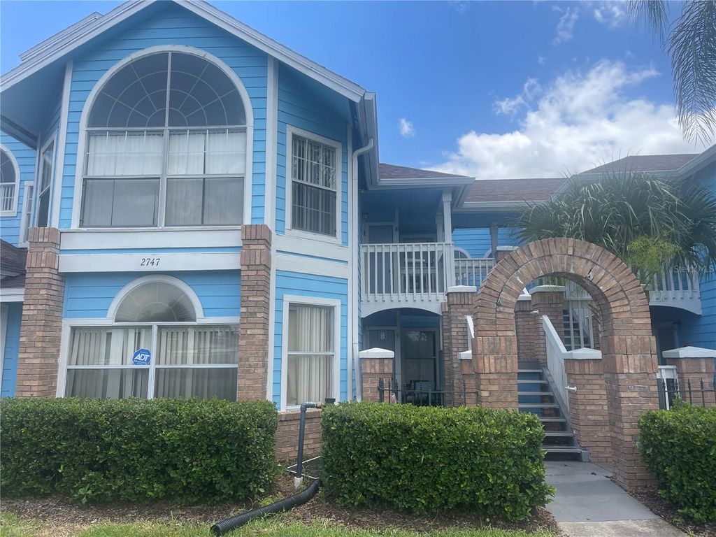 Photo of 2747 N Poinciana Boulevard #10, Kissimmee, FL 34746 (MLS # O6410914)