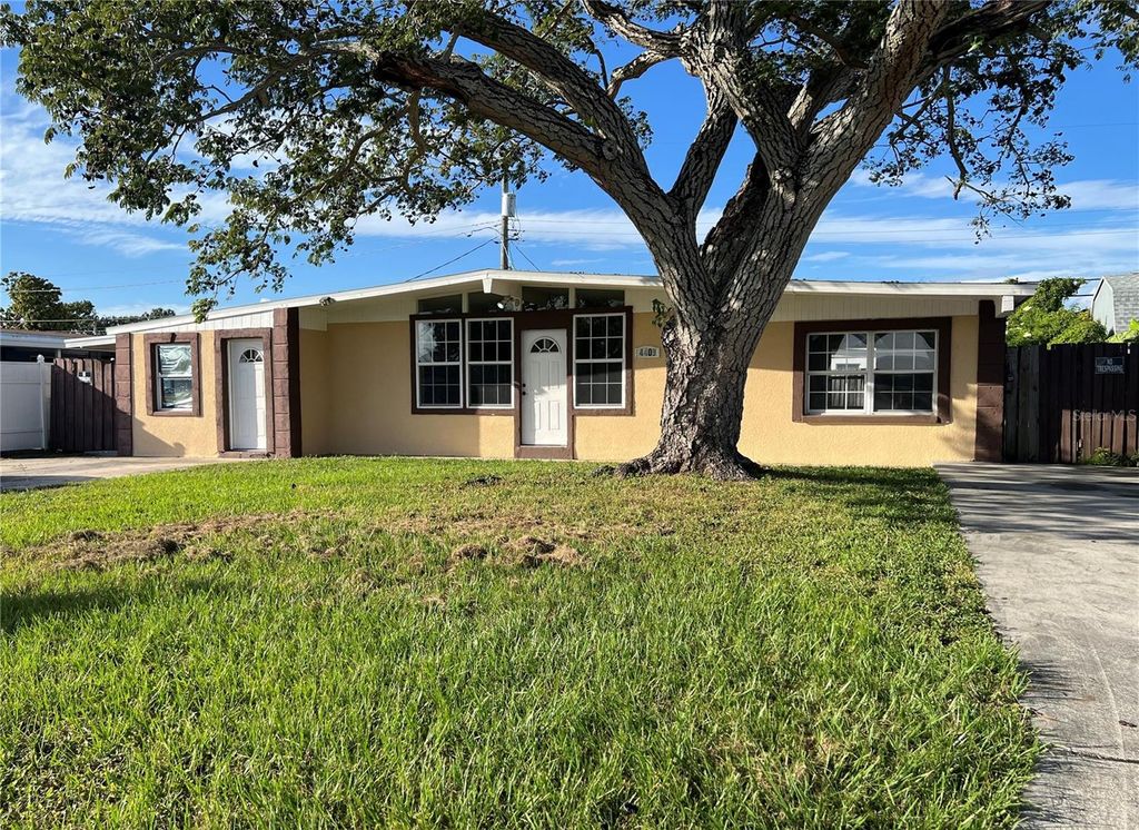 Photo of 4409 W Paris Street, Tampa, FL 33614 (MLS # TB8436211)