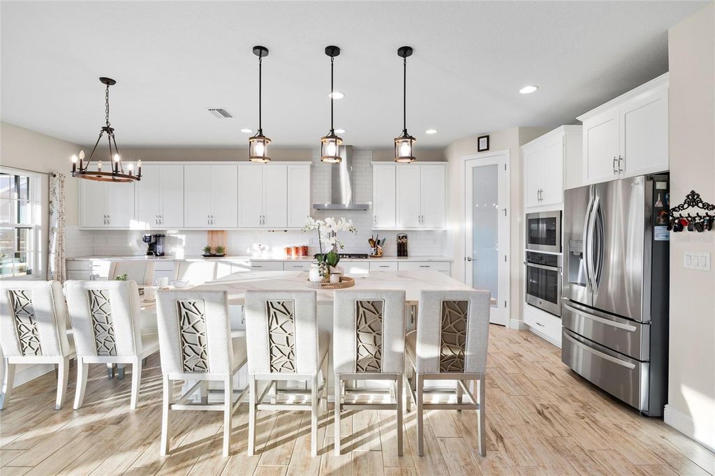 Photo of 12970 Steed Trace Loop, Lithia, FL 33547 (MLS # TB8496964)