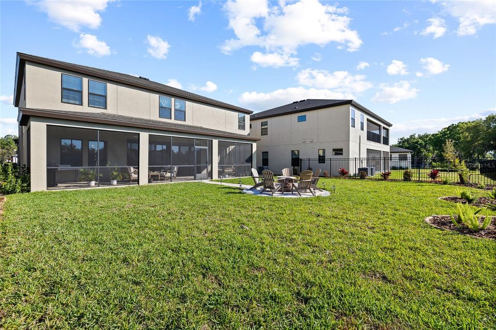 Photo of 12970 Steed Trace Loop, Lithia, FL 33547 (MLS # TB8496964)