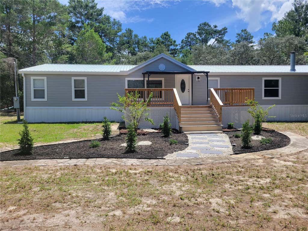 Photo of 7597 N Brutus Avenue, Dunnellon, FL 34433 (MLS # TB8538451)