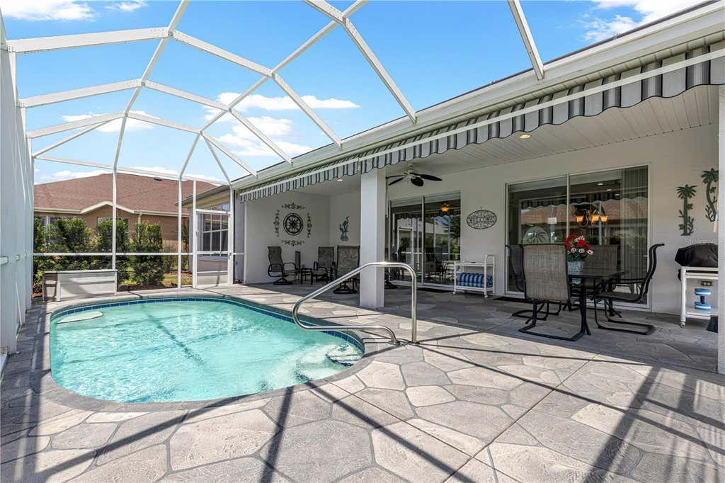 Photo of 13967 SE 96th Circle, Summerfield, FL 34491 (MLS # OM726986)