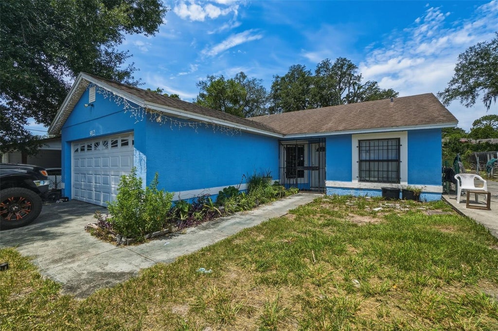 Photo of 912 Paul Street, Orlando, FL 32808 (MLS # O6415667)