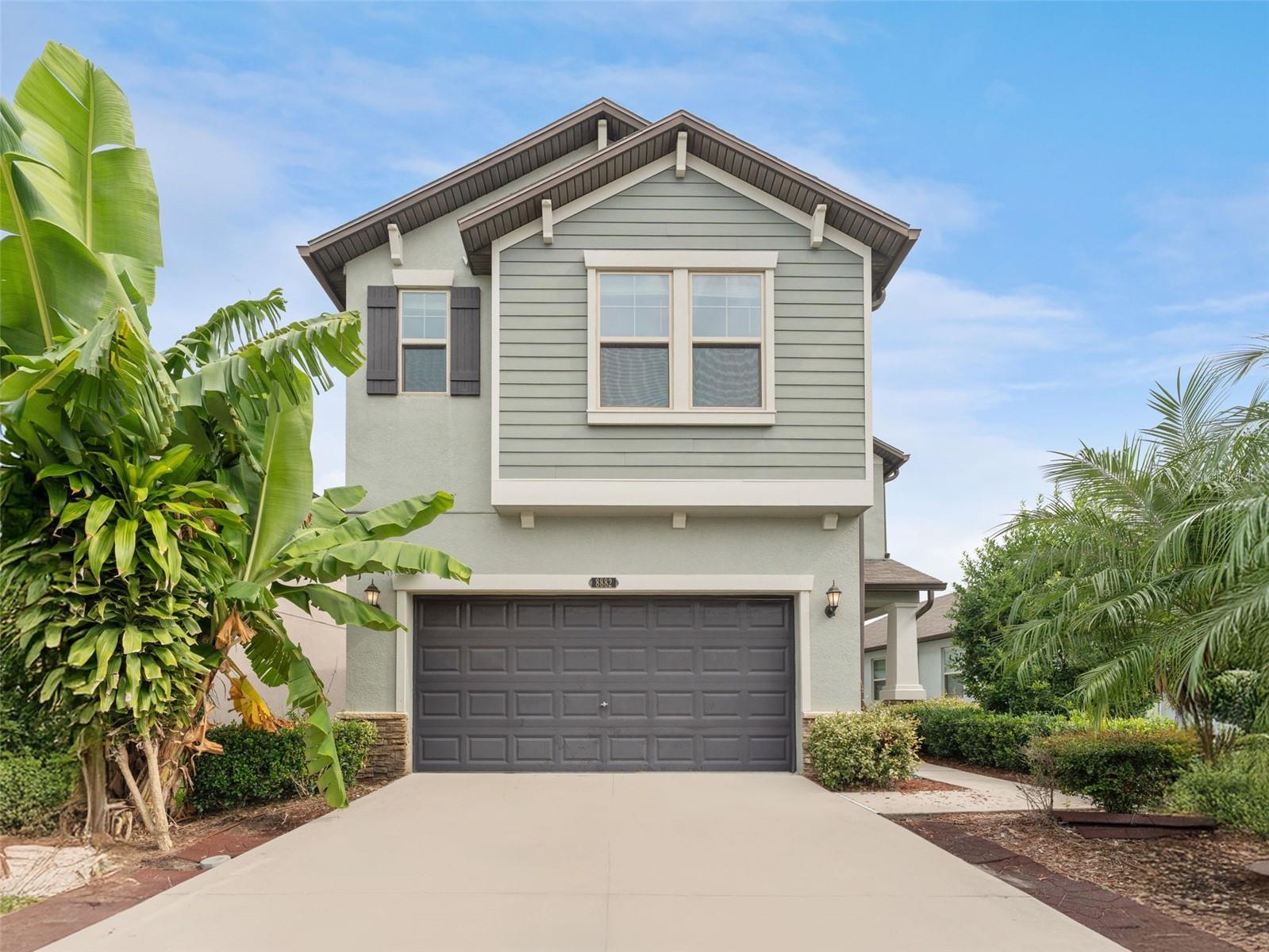 1% lender credit available to qualified buyers! This beautiful two story 2775 sq ft home features four bedrooms, two and a half bathrooms, and a two car garage. Step inside to a grand entry that opens to a large den and an open style living room and dining area filled with natural light from numerous windows and a large sliding glass door. The kitchen offers a walk in pantry, high end stainless steel appliances with an extra refrigerator, a deep stainless steel sink with touchless faucet, and under sink reverse osmosis water system with PH and remineralization alongside a whole home carbon filter water softener. Crown molding accents the downstairs and master bedroom while under stair storage and a mud room add convenience. Upstairs boasts new water resistant wood like laminate flooring, a spacious loft with bright windows, a large master suite with walk in closet and private bath featuring a garden tub with window, separate shower, and double sinks, as well as three additional bedrooms including one nearly the size of the master with walk in closets in two. Additional upgrades include a laundry room with window that passes through the master closet, hurricane rated front door, double pane windows, tankless gas hot water heater, outside electrical panel prepped for generator hookup, surge protectors on both AC systems, and gas dryer and stove hook up connections. The exterior offers a large backyard with a covered lanai, lush landscaping, sprinkler system, refreshed mulch, and a six foot PVC privacy fence with gate installed with heavy duty stainless steel hardware and backed by a lifetime material warranty, creating a private outdoor retreat perfect for entertaining or pets. This home combines thoughtful details and modern conveniences with a versatile floor plan designed for comfort and entertaining.