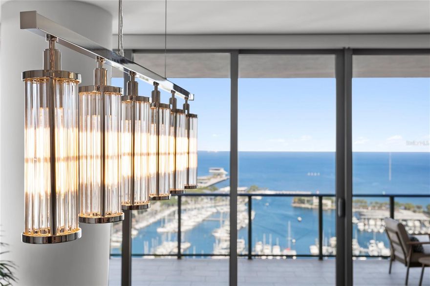 Awe-Inspiring, 1 of 1 Custom Design in the One St Petersburg, the Most Iconic address on the West Coast of Florida! The large 3 bedroom north end unit is highly sought after, the owners started with a blank canvas and spared no expense. From High End Appliances (Thermador), Custom Cabinetry throughout, Beautiful Hardwood Floors, Wall Décor, Designer Lighting and so much more. The Kitchen with its large island is a wonderful mix of Colors, Textures and Design, situated in the Great Room with a view of Tampa Bay that gives the One its well-deserved reputation. Included in the great room is a dry bar with a 100-bottle wine cooler and additional cold storage drawers! The room flows out onto the Balcony through the Glass Wall opening that enhances the view further. The Master Bath in the Owner’s Suite is like no other, the fixtures and finishes are unmatched. Motorized Blinds, Water Filtration, Tankless Water Heater, the list goes on and on! When your address is in the Heart of Downtown St Pete you will live the life you have been dreaming about! The finest restaurants and bars, world renowned museums, live music in every direction, so many major events your calendar will not be able to keep up! On those days when you want to relax at home, the One St Petersburg’s amenities are equal to the finest resorts you have visited throughout your travels. With this apartment as your address, you will truly start your journey to a “Life Well Lived”!